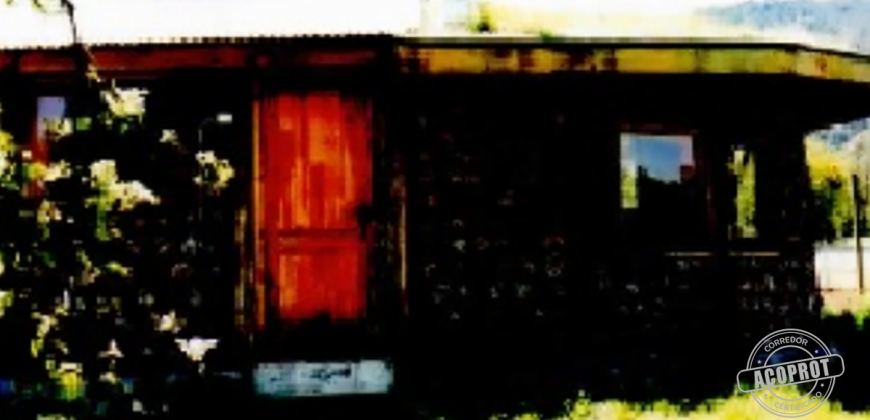 PARCELA CON CASA DE VERANEO