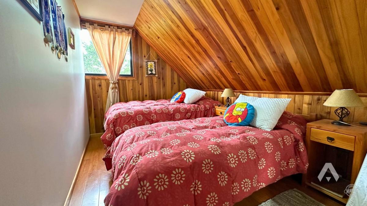 Parcela con casa y cabañas en venta en Villarrica