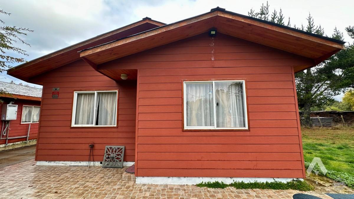 Parcela con casa y cabañas en venta en Villarrica