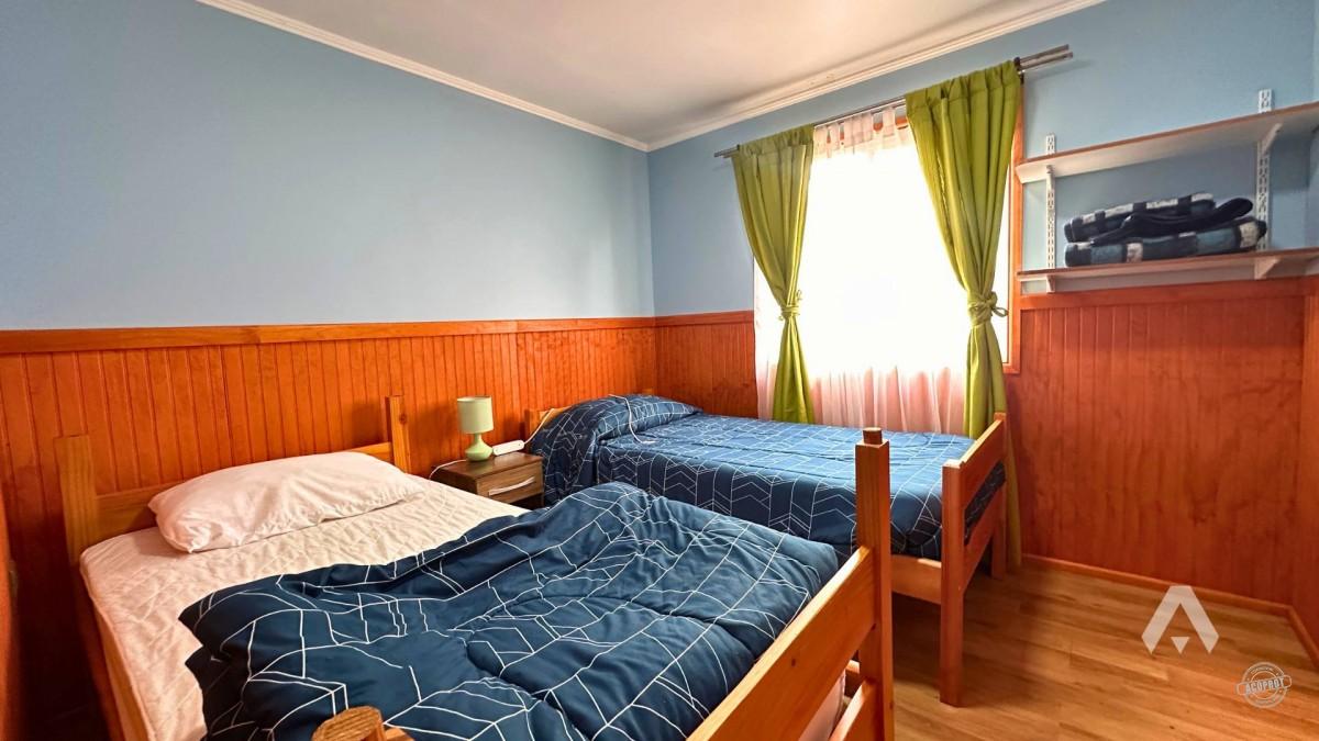 Parcela con casa y cabañas en venta en Villarrica