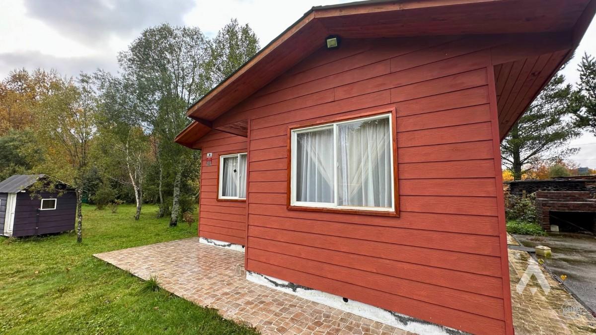 Parcela con casa y cabañas en venta en Villarrica