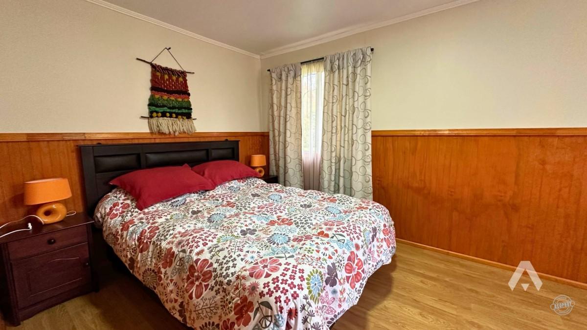 Parcela con casa y cabañas en venta en Villarrica