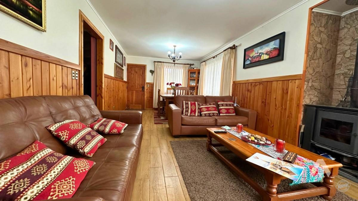 Parcela con casa y cabañas en venta en Villarrica