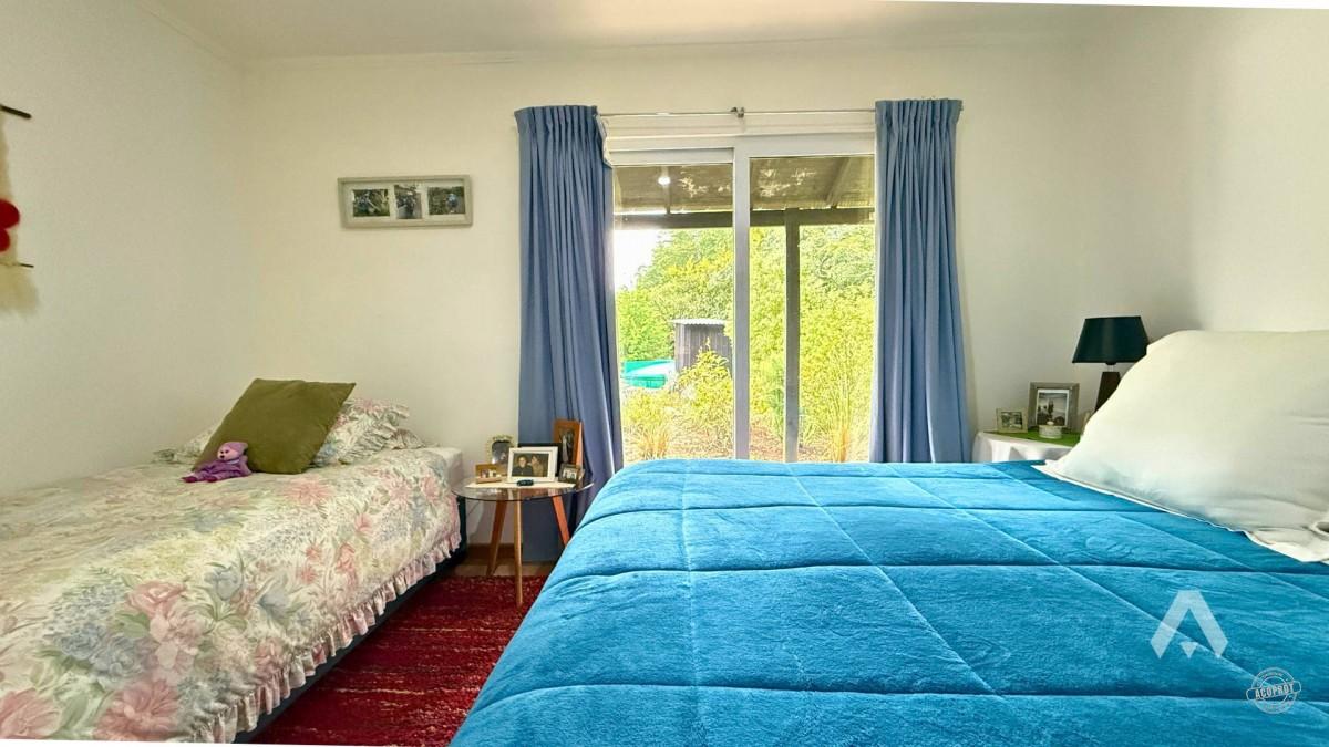 Parcela con dos casas y piscina en Pucón