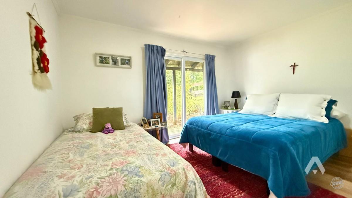 Parcela con dos casas y piscina en Pucón