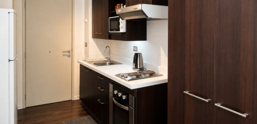 SE ARRIENDA DEPARTAMENTO ESTUDIO AMOBLADO EDIFICIO ARRAYAN